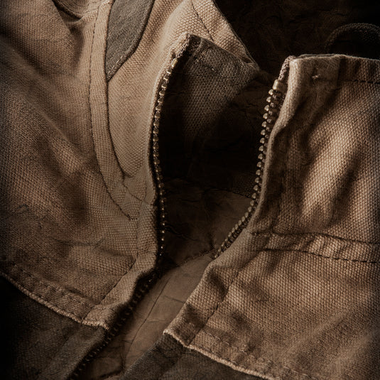 Close-up of authentic, high-quality canvas material used in durable outerwear