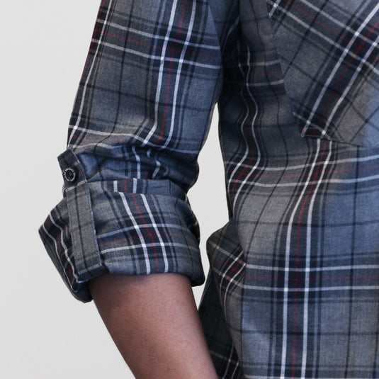 Detail shot featuring convertible sleeves with button tab closure