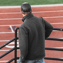 Man wearing black Keystone Full Zip Jacket facing away