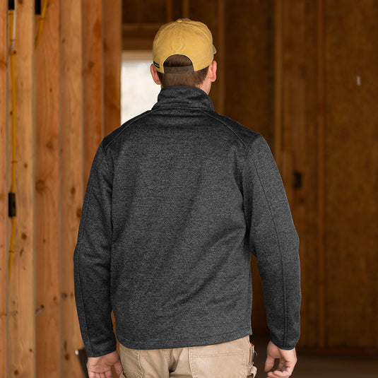 Man wearing charcoal Atlas Men's Jacket walking away