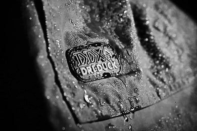 Close-up of DRI DUCK's DDX water-resistant material highlighting superior weather protection.